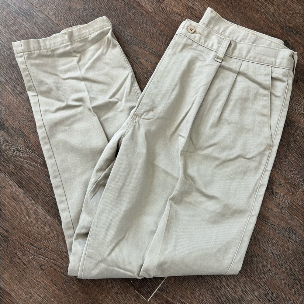 Size 35x30 Wrangler Riata khaki pants.  Pleated front.  Excellent condition.